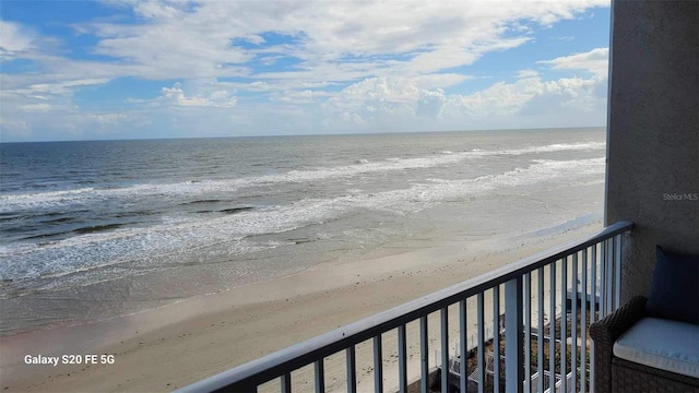 view of water feature with a beach view