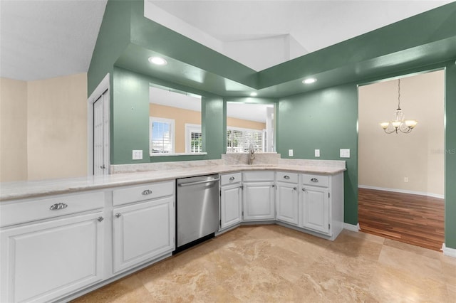 kitchen with light hardwood / wood-style flooring, sink, an inviting chandelier, stainless steel dishwasher, and white cabinets