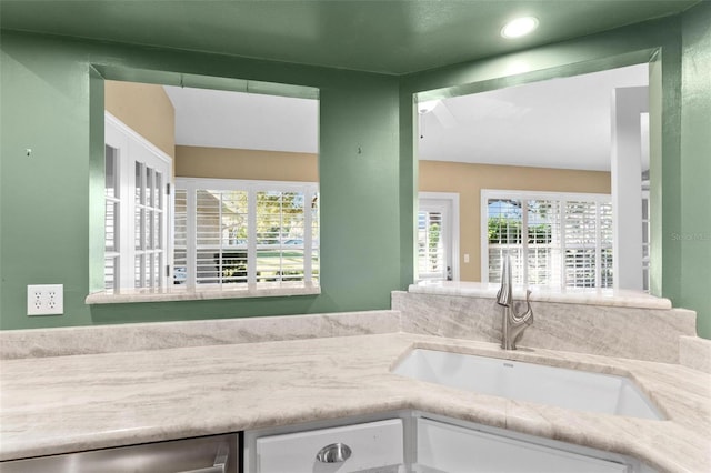 bathroom featuring vanity and plenty of natural light