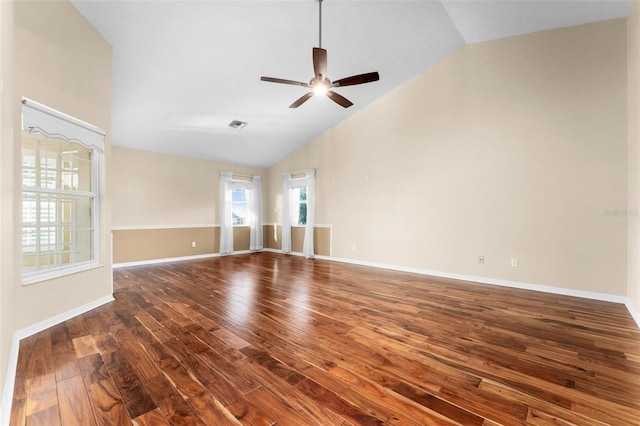 unfurnished room with dark wood-type flooring, ceiling fan, and vaulted ceiling