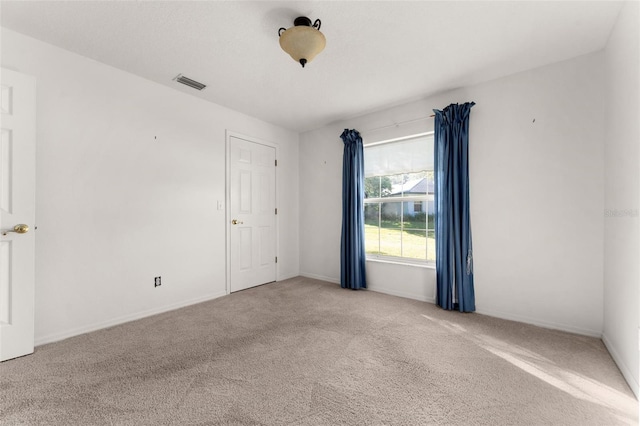 empty room featuring carpet