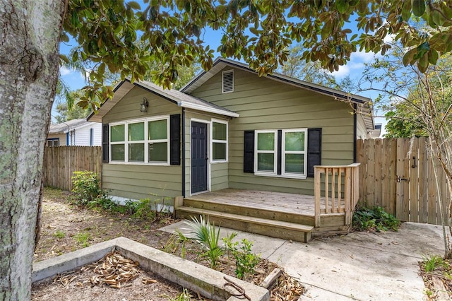 view of front of house featuring a wooden deck