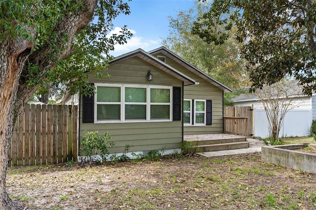 view of front of house featuring a wooden deck