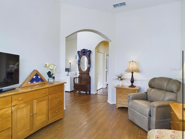 living area featuring dark hardwood / wood-style flooring