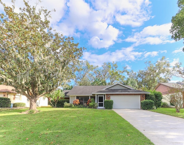 single story home with a front lawn and a garage