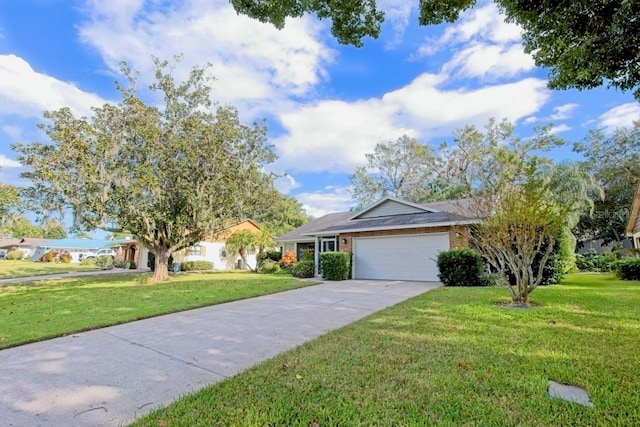 ranch-style house with a garage and a front yard