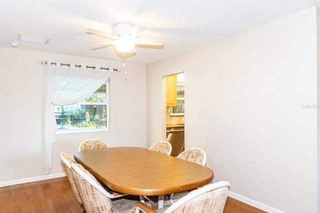 dining area featuring hardwood / wood-style floors and ceiling fan