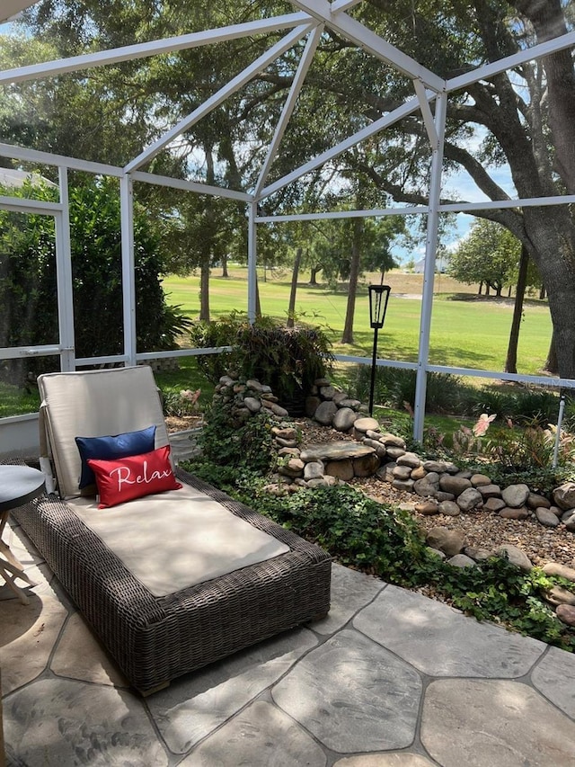 view of patio / terrace with glass enclosure