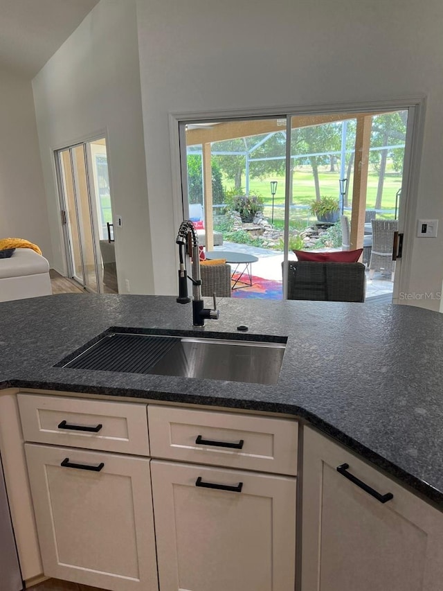 kitchen with sink and white cabinets