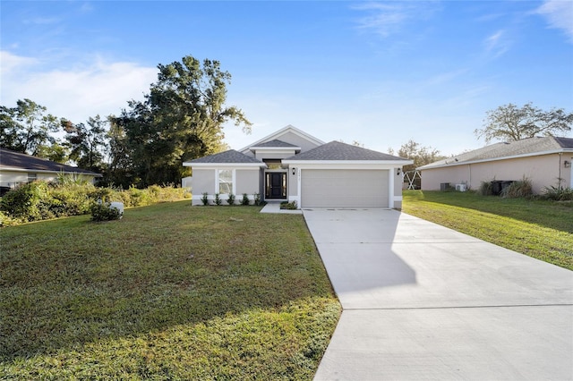 view of front facade with a garage and a front lawn