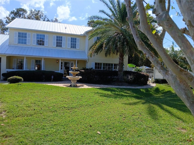 view of front of house with a front lawn