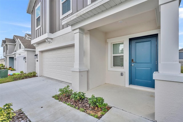 property entrance with a garage