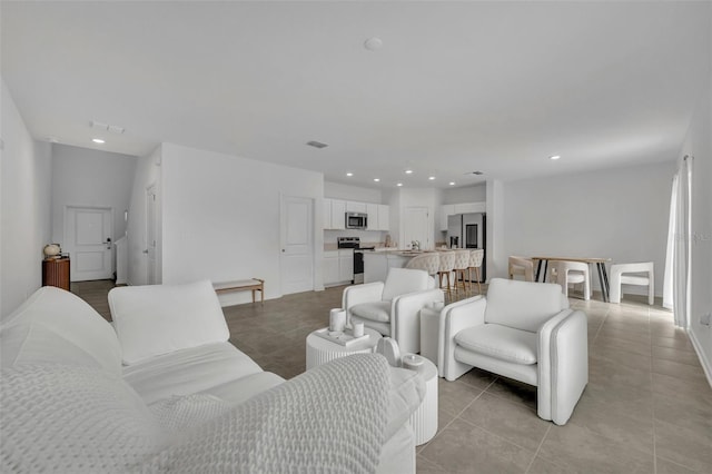 living room featuring light tile patterned floors