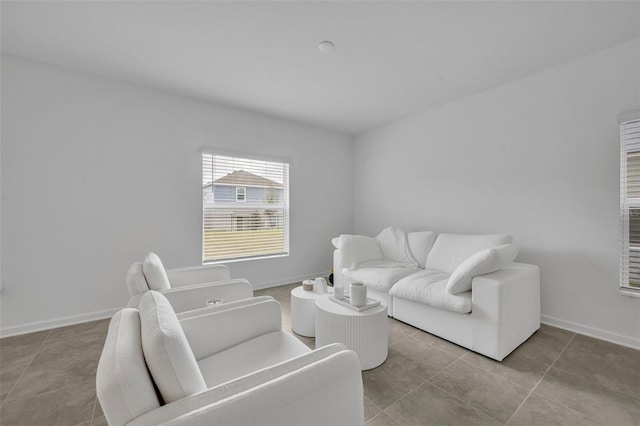 living room with light tile patterned floors