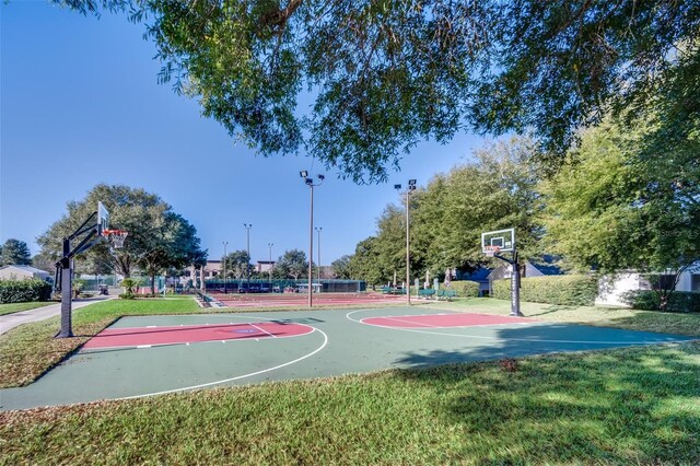 4088 Kingsley St, Clermont, FL 34711 - view of sport court featuring a yard and community basketball court