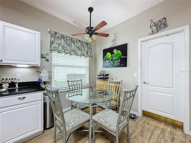 4088 Kingsley St, Clermont, FL 34711 - dining space with light wood-style floors, baseboards, and a ceiling fan