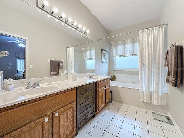 4088 Kingsley St, Clermont, FL 34711 - bathroom featuring double vanity, a sink, shower / bath combo with shower curtain, ensuite bathroom, and tile patterned flooring
