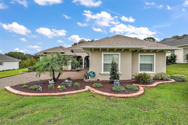 view of front of home with a front lawn