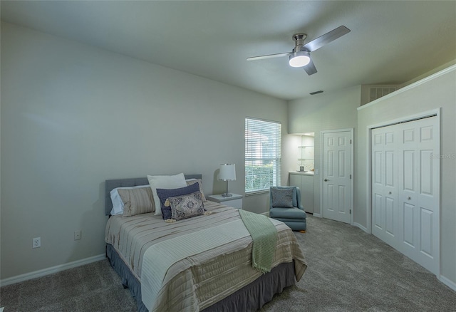 carpeted bedroom featuring ceiling fan