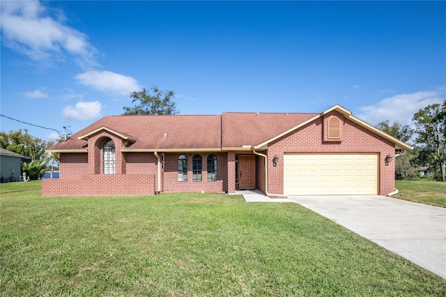 single story home featuring a garage and a front lawn