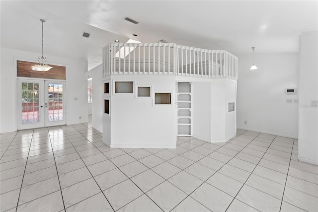 interior space featuring french doors and light tile patterned flooring