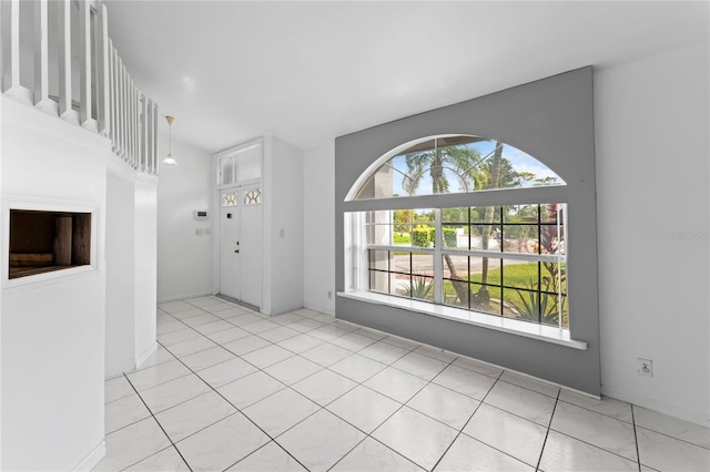 interior space with light tile patterned floors