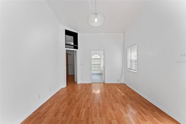 unfurnished room with light hardwood / wood-style floors