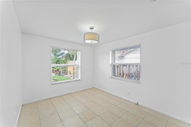 view of tiled spare room