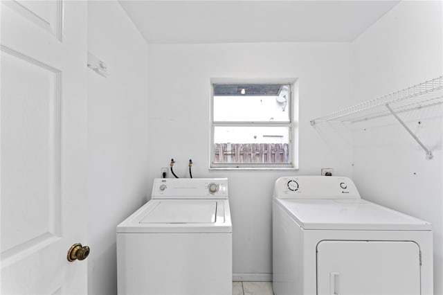 laundry room featuring independent washer and dryer