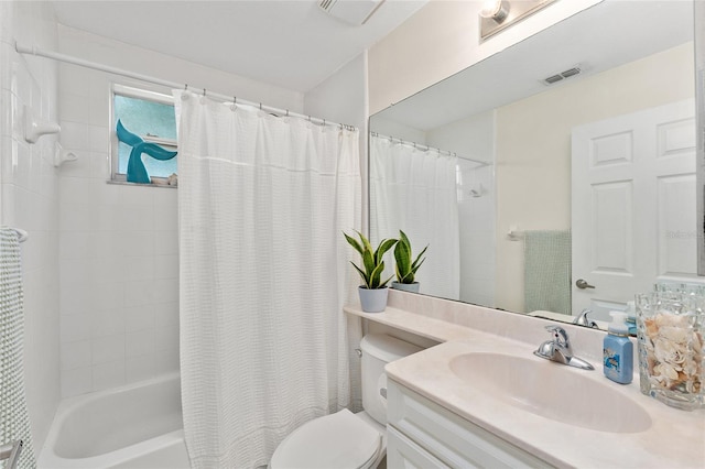 full bathroom featuring vanity, shower / bath combination with curtain, and toilet