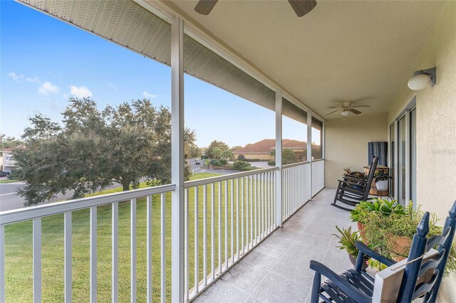 balcony featuring ceiling fan