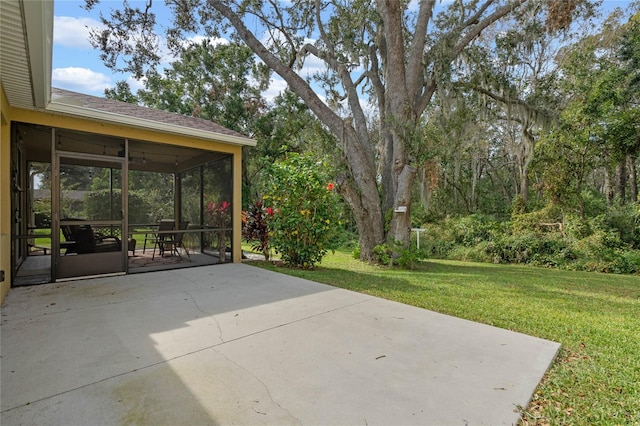 view of patio / terrace with a sunroom