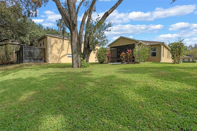 view of yard with a trampoline