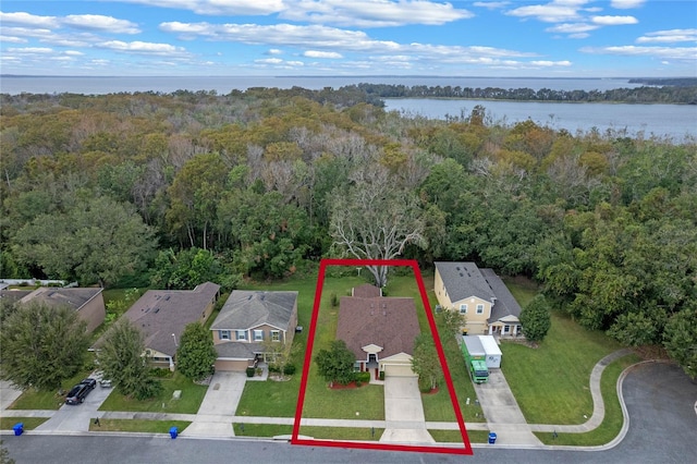 birds eye view of property featuring a water view