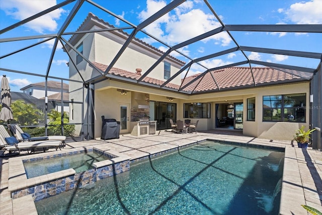 view of swimming pool featuring a patio, an in ground hot tub, and glass enclosure