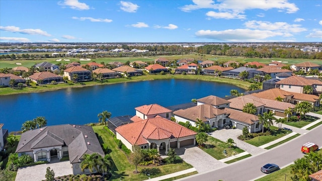 bird's eye view with a water view