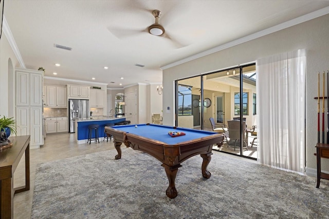 playroom with crown molding, pool table, and ceiling fan