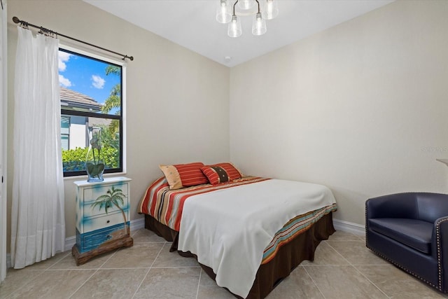 bedroom with light tile patterned flooring