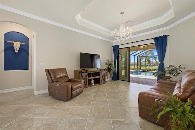 living room featuring crown molding, light tile patterned flooring, and a tray ceiling