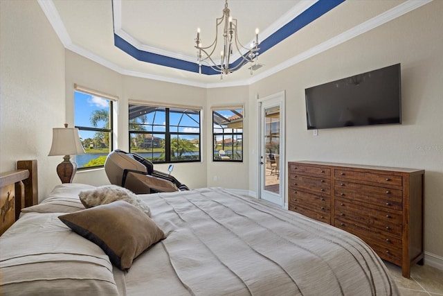 bedroom with an inviting chandelier, ornamental molding, a tray ceiling, and access to outside