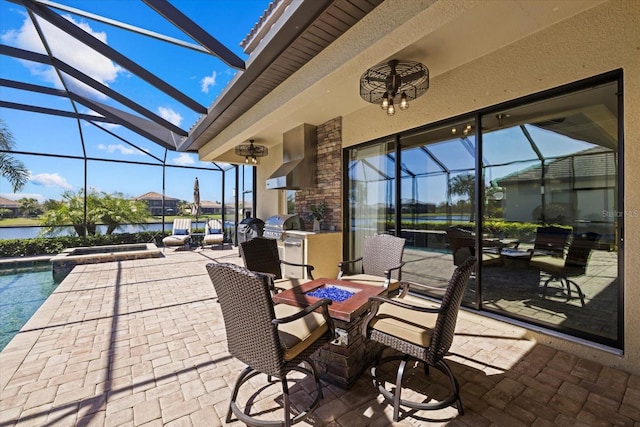 view of patio featuring a water view, glass enclosure, and a grill