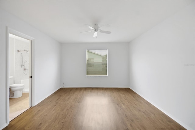 spare room with light hardwood / wood-style floors and ceiling fan