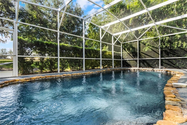 view of pool featuring a lanai