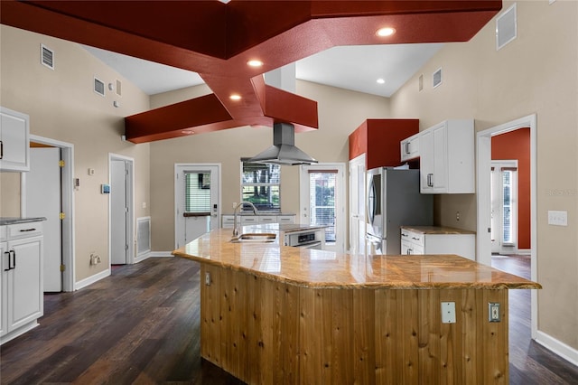 kitchen featuring white cabinets, dark hardwood / wood-style flooring, sink, and island range hood