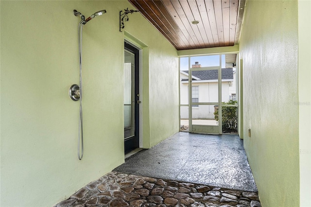 corridor featuring wood ceiling