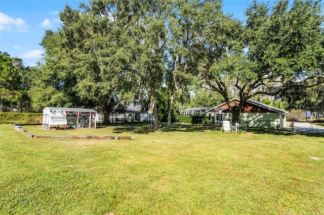 view of yard with a carport