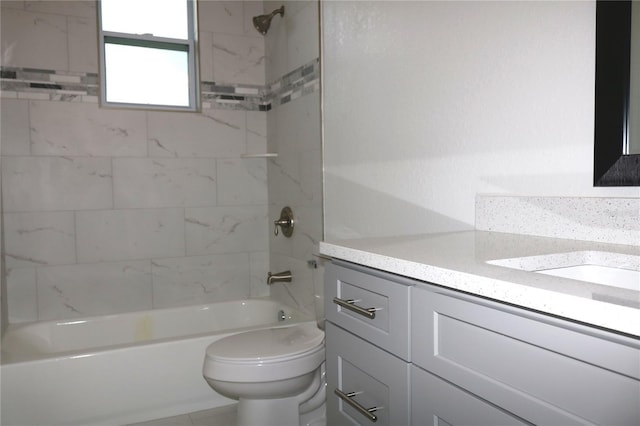 bathroom featuring shower / bathing tub combination, vanity, and toilet