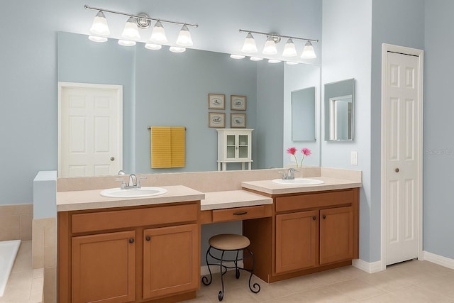 119 Crescent Moon Dr, Groveland, FL 34736 - bathroom featuring double vanity, tile patterned floors, and a bath