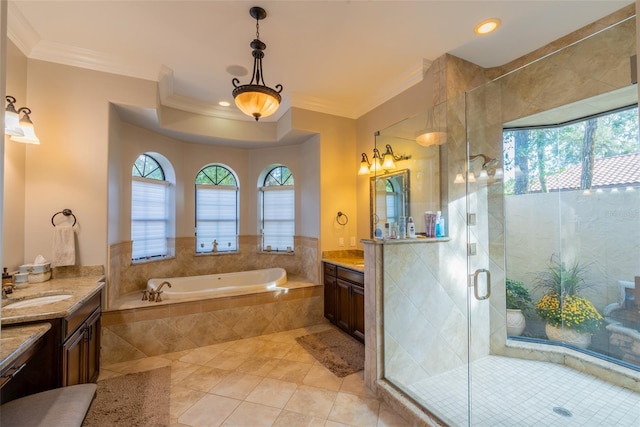 bathroom with tile patterned flooring, vanity, separate shower and tub, and crown molding