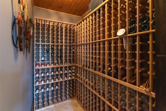 wine cellar featuring tile patterned flooring and wooden ceiling